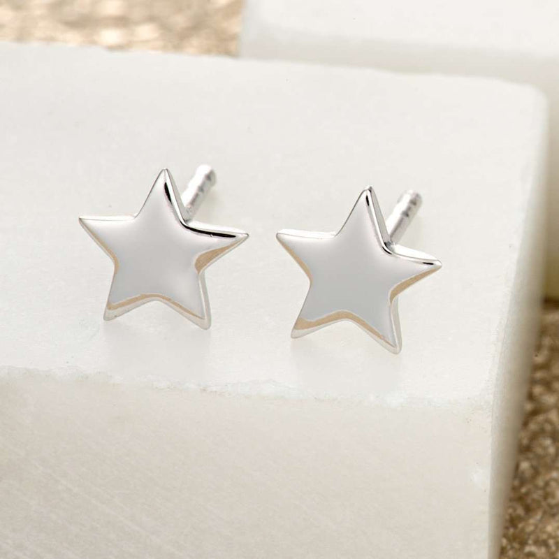 Sterling silver on sale tiny star earrings
